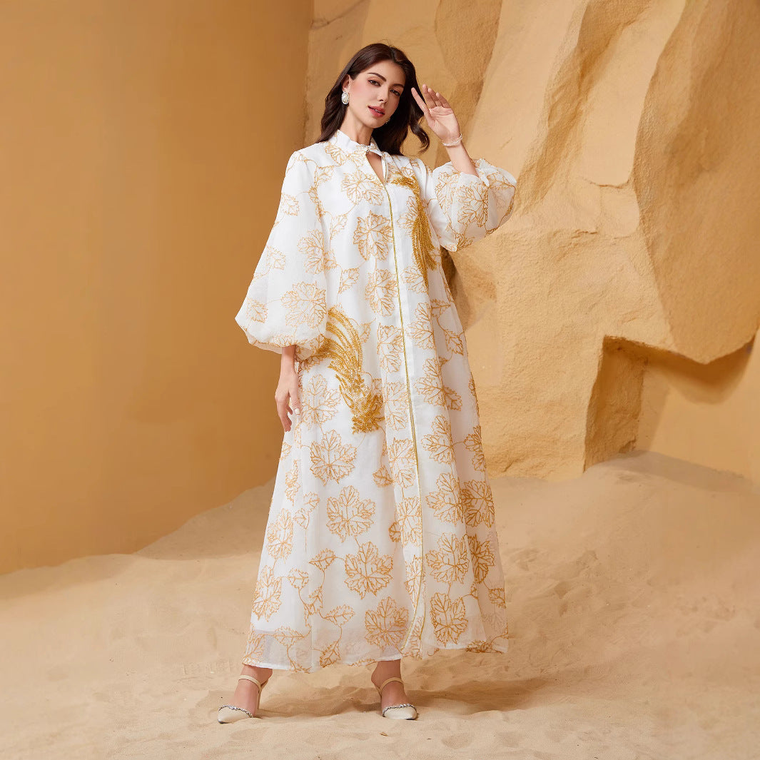 Viral Instagram UAE Dubai Stand Collar Abaya Off White All Over Golden Leaf Jacquard Print Hollow Placket Vertical Golden Tassel Sequins Embroidery Puff Bubble Long Sleeve Floor Length Plus Size GCC Women Modest Maxi Robe For Saudi Ramadan Tarawih OO