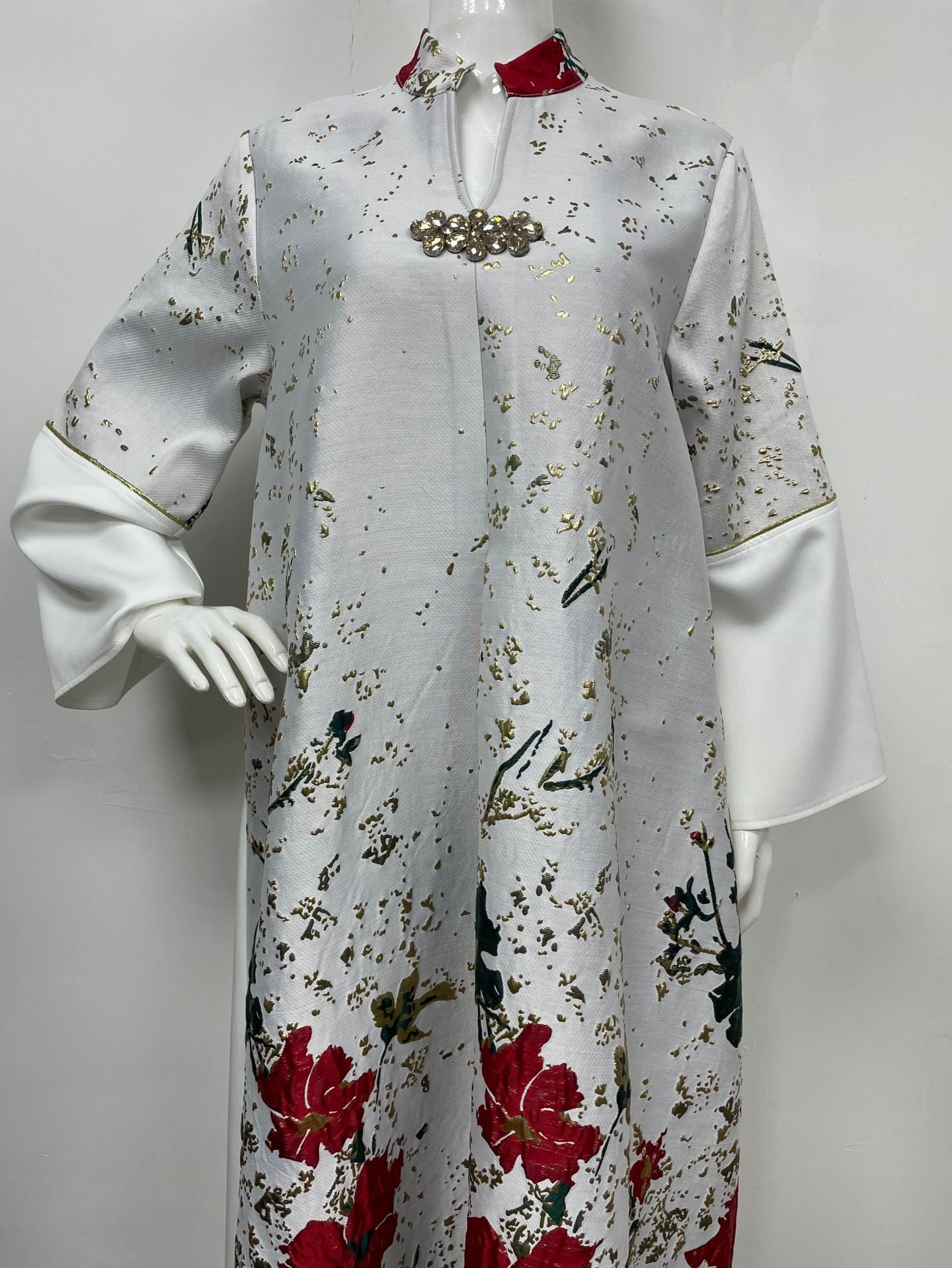 2026 Reels Opulent Floral Statement Kaftan Cream Base Gold Dust Foil Peony Print Stand Mandarin Collar Metal Clasp Fastener Split Bell Long Sleeve Floor-Sweeping Loose Drape Cut Exclusive Khaleeji Atelier Fit For Gulf Ladies Walima Wedding & Iftar Ba