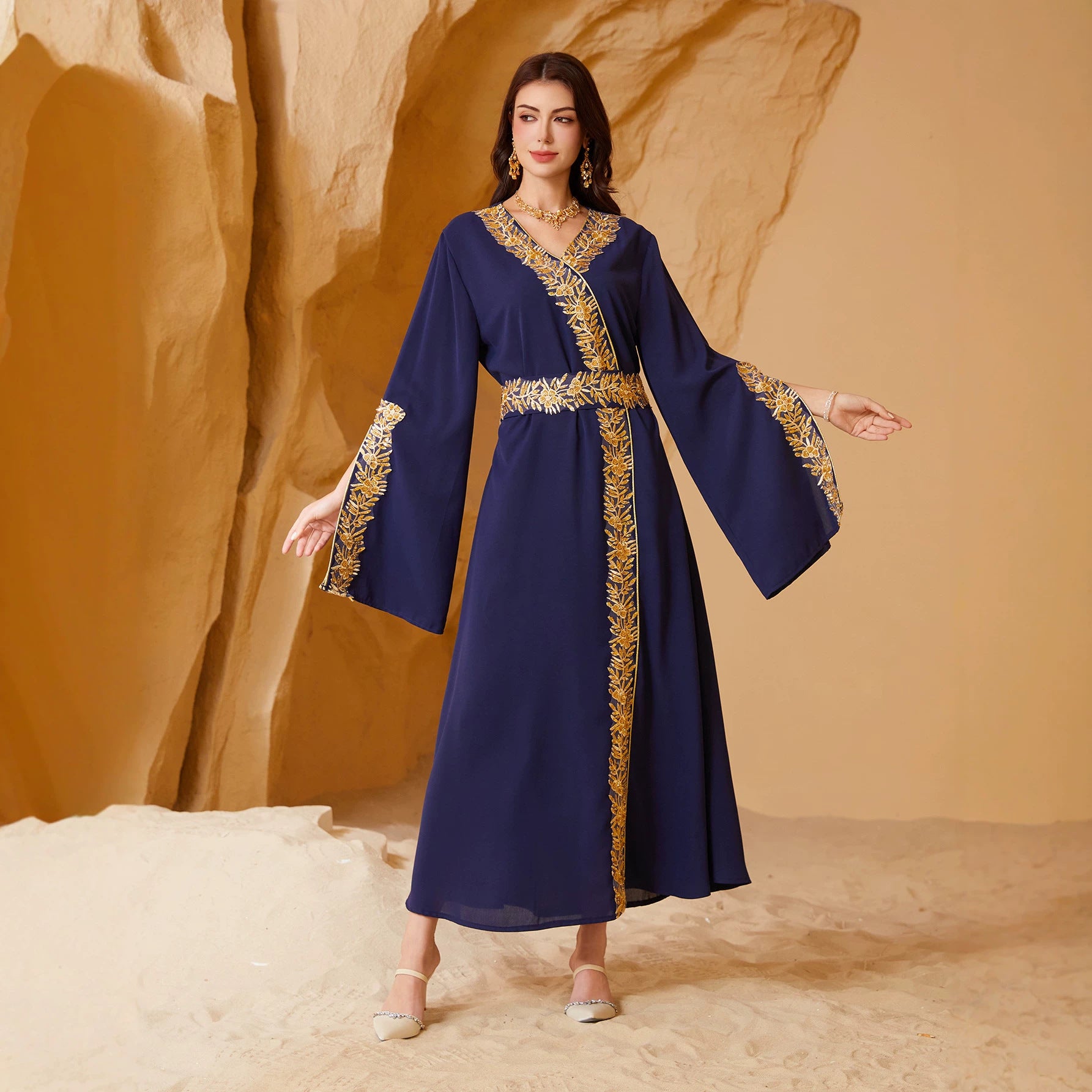 Smooth Crepe Wrap V Neck Continuous Hand Stitched Golden Foliage Border Embroidery Self-Fabric Cinch Belt Oversized Flared Bell Cuffs Floor-Sweeping A-Line Plus Inclusive Silhouette Qatari Omani Kuwaiti Ladies Modest Kaftan For Walima Wedding Gala If