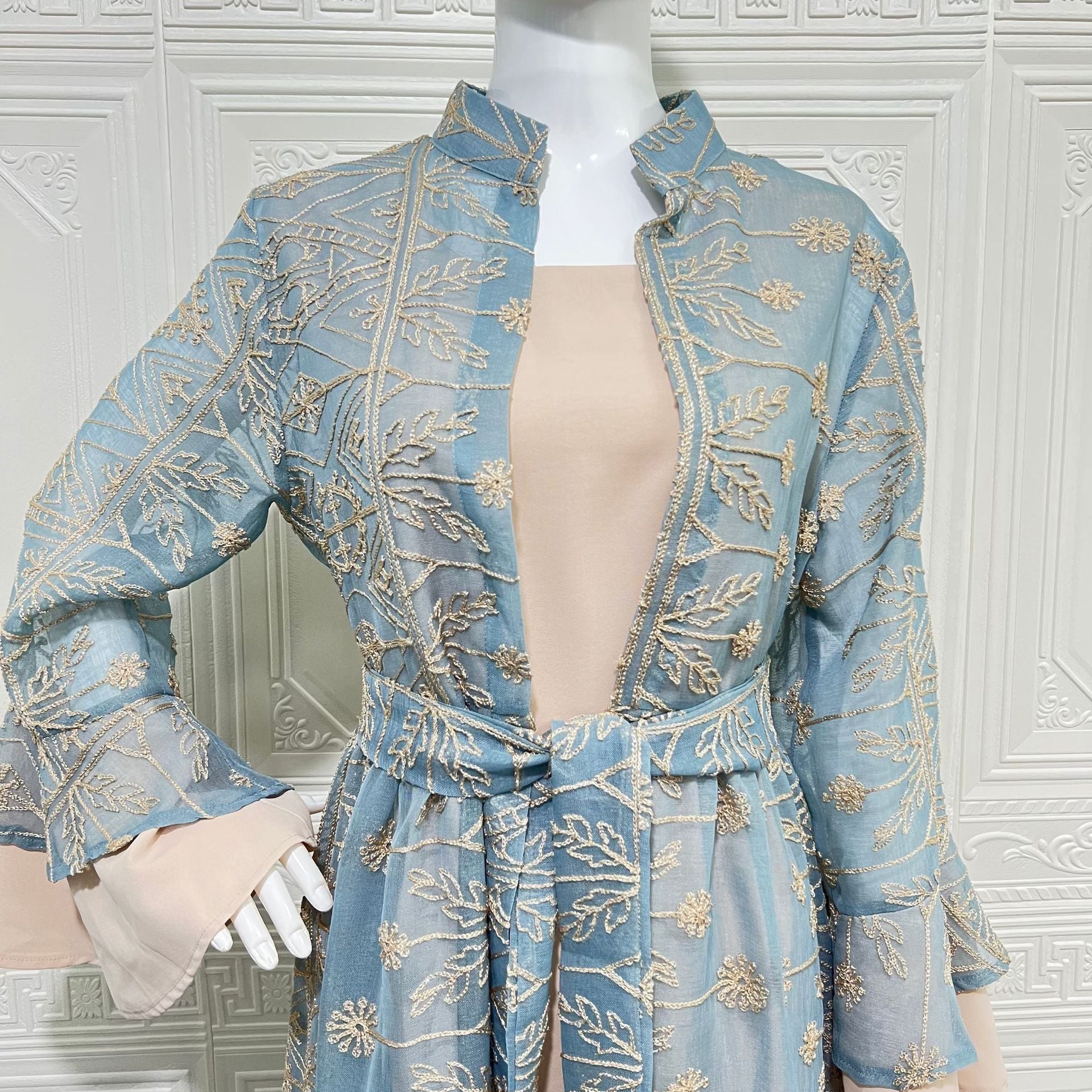 Arabian Pastel Boutique Designer Modest Layered Attire Soft Muted Sky Lightweight Transparent Mesh All Over Vintage Leaf Daisy Thread Motif Mini Stand Neck Self-Tie Waist Belt Double Flared Bell Cuff Sleeves Semi-Sheer Open Front Full Length Outer Ro