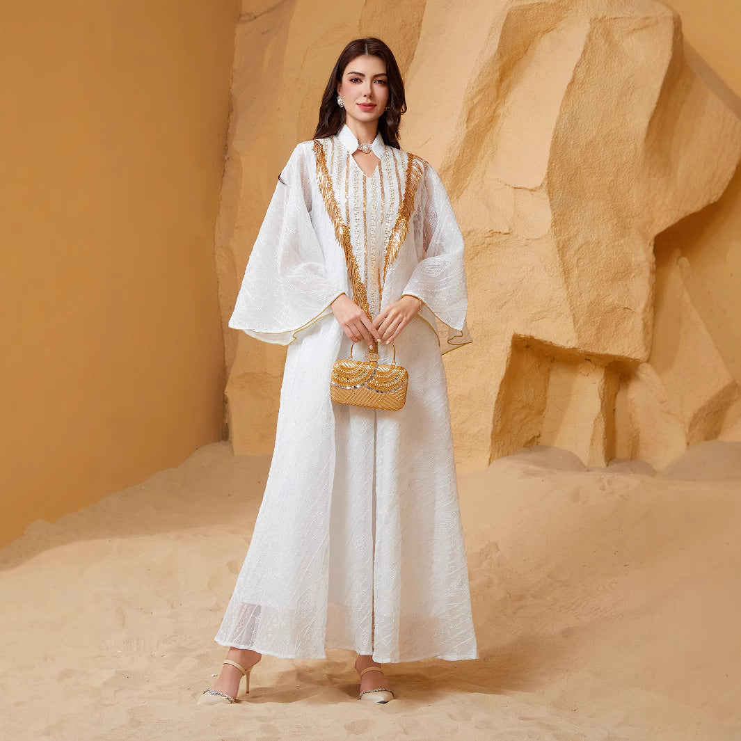 Elegant long evening gown crafted with tulle, embroidery and sequins, stylish and sophisticated, ideal for parties and formal dinners, trustworthy quality
